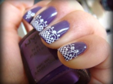 Purple manicure with white lace