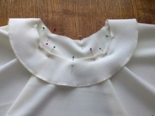 Laying the folds on the neck