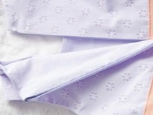 Stretching a zipper on a baby dress