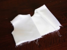 Stitching the baptismal lining and bodice