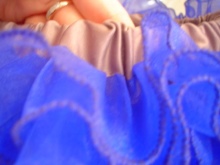 Scrunching gum on the skirt for a girl