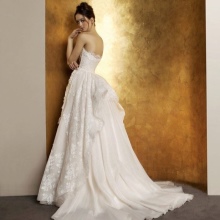 Magnificent wedding dress with a train with a brush