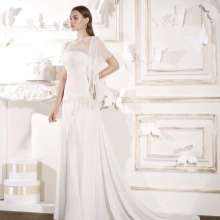 Wedding dress with a train and a deep neckline
