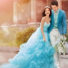 Blue wedding dress with the groom's outfit