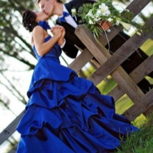 Blue bridal dress with the groom's outfit
