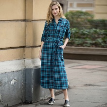 Green and blue plaid long dress with black sleepers