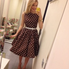 Brown dress in white polka dots with a fluffy skirt