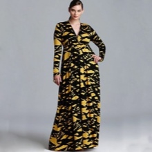 Yellow and black long dress with a deep neckline and a long sleeve for full