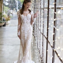Wedding dress with transparent sleeves
