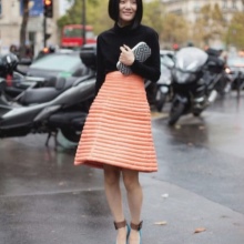 Medium length A-line orange skirt for summer