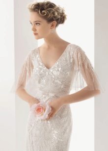 Wedding dress with a short transparent sleeve