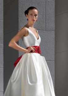 Magnificent wedding dress with a ribbon decorated with a bow