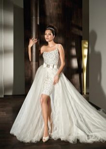 Wedding dress with a detachable train on the belt