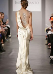 Wedding dress in the Greek style with drapery on the back