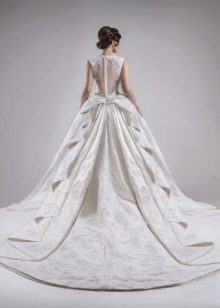 Wedding magnificent dress with the decorated loop