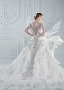Wedding dress with sewn rhinestone train