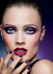 Makeup with purple shadows and red lipstick