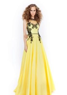 Yellow evening dress with black pattern