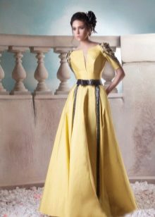 Yellow evening dress with black leather inserts