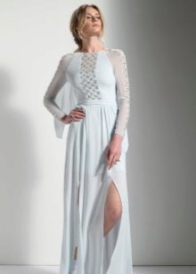 White evening dress with a slit and transparent inserts