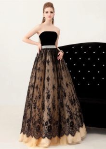 Black lace evening dress in combination with a contrasting backing