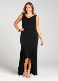 Evening dress for full black with an asymmetric skirt