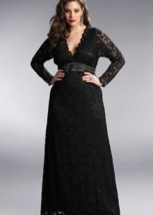 Lacy black evening dress in a floor for full