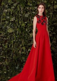 Red evening dress with black decor