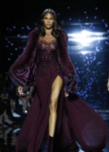 Evening dress with a deep neckline and slit