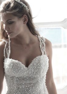 Wedding dress with pearls on the corset