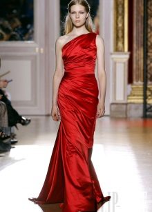 Red evening dress on one shoulder