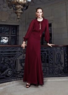 Red evening dress in a festive floor
