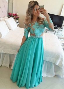 Long evening dress of turquoise color with lace