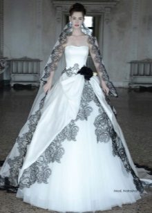 Wedding dress from Atelier Aimee magnificent with black lace