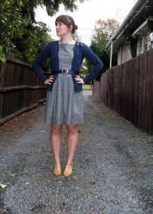 Dark jacket with gray dress