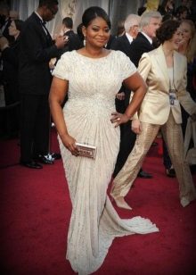 The correct style and type of dress that hides the belly