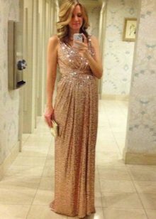 Brilliant beige long dress in the Greek style for pregnant women