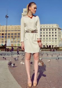 Milk dress in combination with bright red decorations