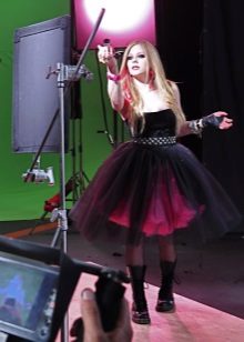 Avril Lavigne in a short dress in the style of punk rock