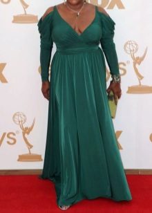 Accessories and decorations for a long green evening dress for full