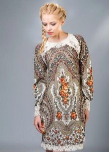 Dress in Russian style with patterns and lace on the hem