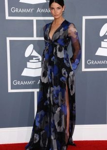 A long high-waisted dress with a floral print and slits on the sides for pregnant women