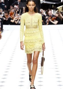 Yellow lace dress with ruffles