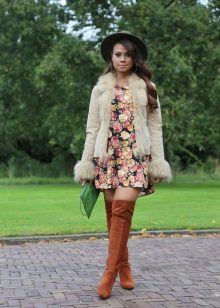 Fur jacket and brown boots for A-line dress