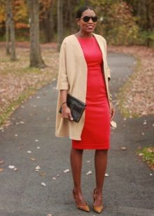 Sheath dress in combination with an elongated cardigan