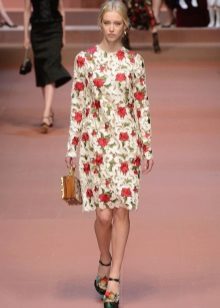 Beige dress with roses and perforations at the fashion show Dolce & Gabbana