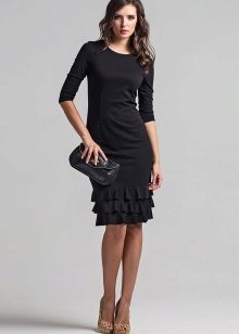 Black dress with frill at the hem