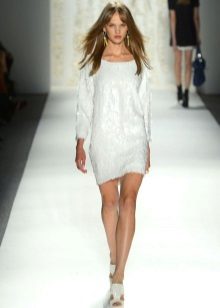 White dress-tunic at a fashion show