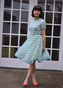 White dress with blue polka dots