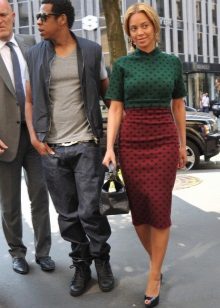 Two-color red-green dress in black small polka dots